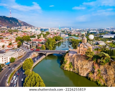 Metekhi Church aerial panoramic view in Tbilisi old town. Tbilisi is the capital and the largest city of Georgia, lying on the banks of the Kura River. Royalty-Free Stock Photo #2226255819