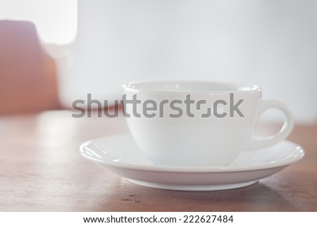 White coffee cup in coffee shop, stock photo