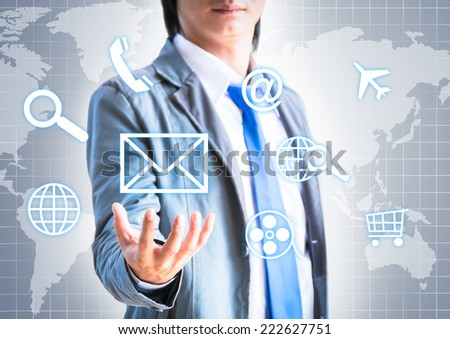 Man pressing modern touch screen buttons with a grey technology background 
