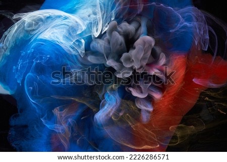 Blue red ink abstract background. Acrylic paint backdrop for perfume, hookah, cosmetics. Mysterious smoke clouds, colorful fog