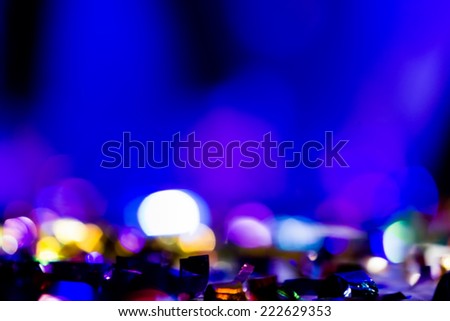 Defocused entertainment concert lighting on stage, bokeh.