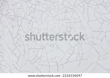Cracked ceramic texture. Cracked white ceramic background. Royalty-Free Stock Photo #2226336047