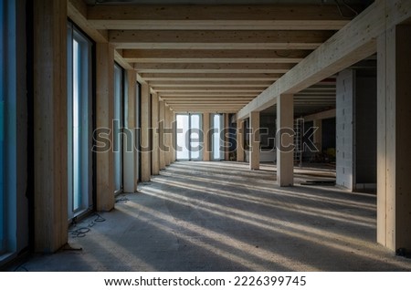 construction site of a sustainable Timber-concrete composite office building  Royalty-Free Stock Photo #2226399745