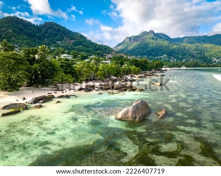 Aerial landscape overlooking the coastline of Mae Island in the Seychelles. Turquoise water of the Indian Ocean, tropical trees and beaches Royalty-Free Stock Photo #2226407719