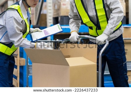 Worker inspecting luggage. Cargo inspection. Quarantine station. Royalty-Free Stock Photo #2226437233