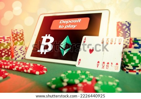 Deposit funds with crypto to play casino games and poker, concept  Royalty-Free Stock Photo #2226440925