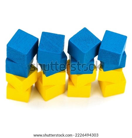 Blue and yellow cubes stacked on top of each other.