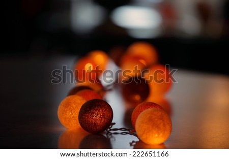 Glowing balls on the table, abstract background (shallower depth of field)
