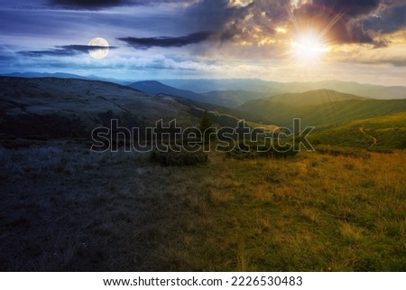 carpathian mountain range in summer at twilight. day and night time change concept. landscape with forested hills and grassy meadows rolling down in to the valley beneath a sky with sun and moon