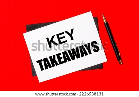 Black pen, envelope and white card with the text KEY TAKEAWAYS on a bright red background