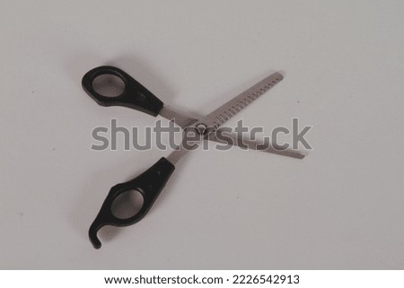 thinning scissors or teak scissors are for thinning hair without reducing its length. The blade shape of the thinning shears is serrated like a comb