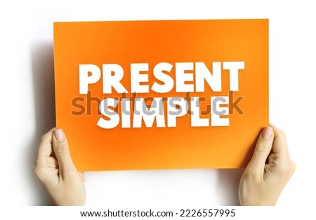 Present Simple - one of the verb forms associated with the present tense in modern english, text concept on card