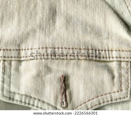 Pocket on denim texture. Stock photo of high quality fabric.