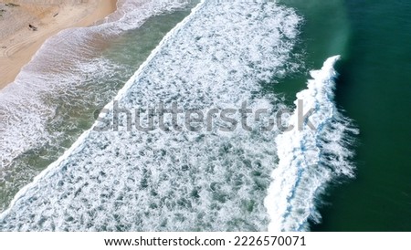 Aerial shot of the sea waves, the beach, the sea, the beautiful beach, the sea waves