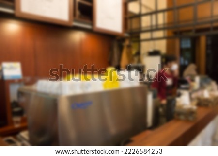 gaussian blur image of coffee counter at cafe 