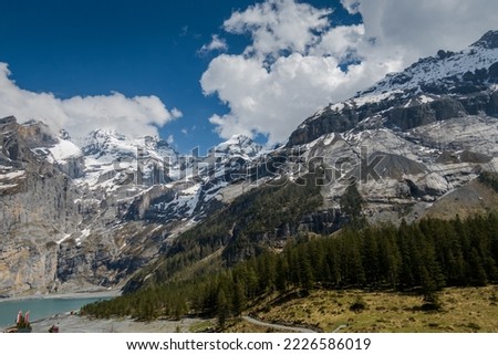 The magnificent Swiss Alps. Mountain peaks and lakes. Incredible mountain landscape