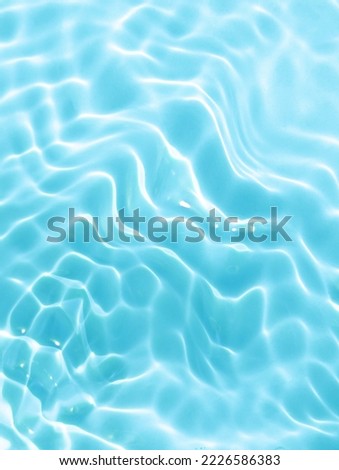Realistic natural water wave overlay for background, blurred transparent reflection​ on​ surface​ blue​ water​ texture, trendy abstract background