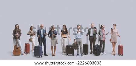 Group of diverse traveling people standing in line with trolley bags, travel and tourism concept, isolated on gray background Royalty-Free Stock Photo #2226603033