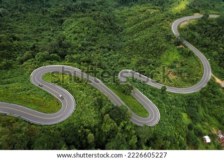 Aerial view country road in mountain. Royalty-Free Stock Photo #2226605227