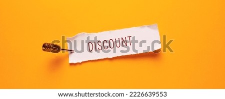 Close up conceptual shot of a business idea showing Discount