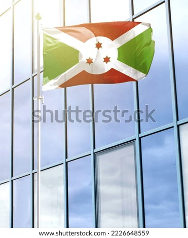Flag of Burundi on a flagpole