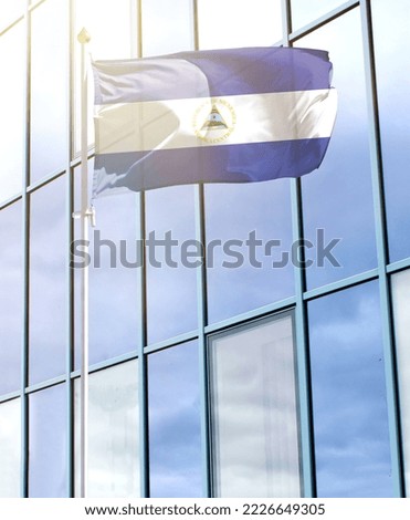 Flag of Nicaragua on a flagpole