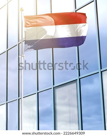 Flag of Netherlands on a flagpole