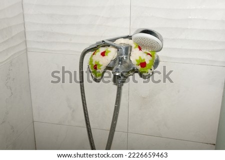 Dirty bathroom and shower set with tap