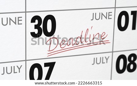  Deadline written on a calendar - June 30 Royalty-Free Stock Photo #2226663315