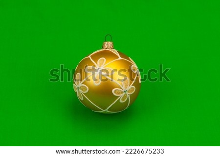 сhristmas balls and garland on green screen background.