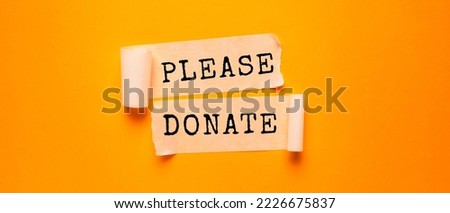 Close up conceptual shot of a business idea showing Donate