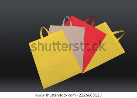 Non Woven Fabric bags isolated on black background