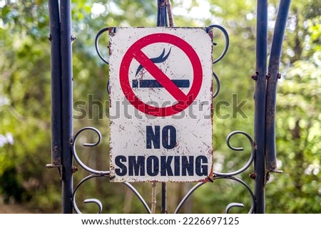 no smoking sign in the park
