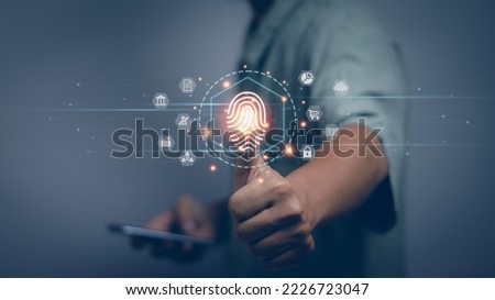 Users are showing access to personal data by fingerprint scanning on virtual screens, cyber technology data protection concept or digital network transactions go online with safety.