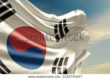Waving flag of South Korea in beautiful sky. South Korea flag for independence day. The symbol of the state on wavy fabric. Royalty-Free Stock Photo #2226745637