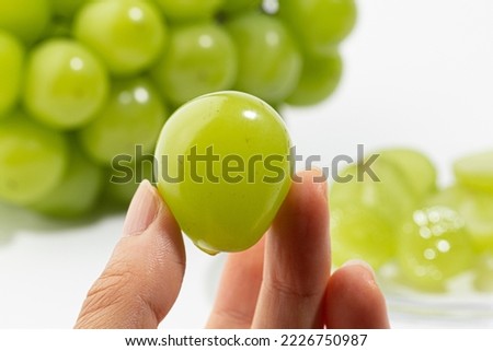Shine Muscat green grape on white background Royalty-Free Stock Photo #2226750987