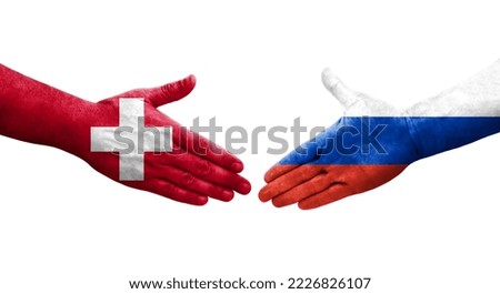 Handshake between Switzerland and Russia flags painted on hands, isolated transparent image.