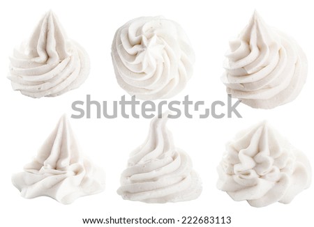 Set of six different white decorative swirling toppings for dessert isolated on white depicting whipped cream, ice cream or frozen yogurt Royalty-Free Stock Photo #222683113