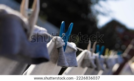 clothesline with brackets and laundry