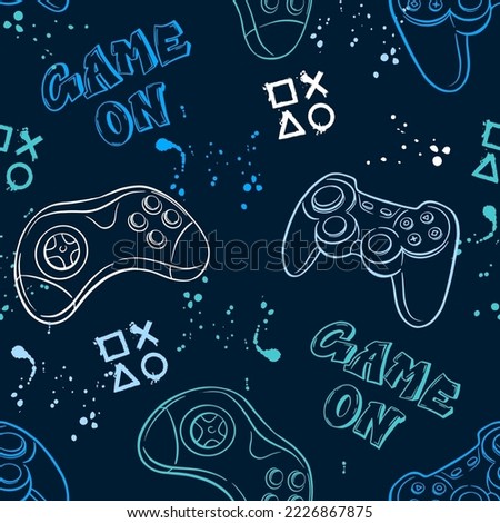 Seamless abstract pattern with colourful silhouettes joystick game. Background for boys. Royalty-Free Stock Photo #2226867875