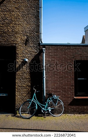 Solo Bike Against Brick Wall