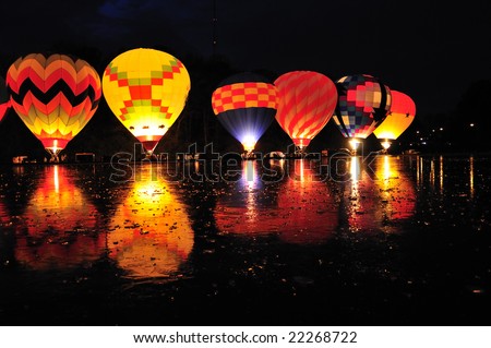 Balluminaria 2008, The world's largest hot air balloon glow reflected in the frozen water of Mirror Lake in Eden Park Cincinnati Ohio USA Royalty-Free Stock Photo #22268722