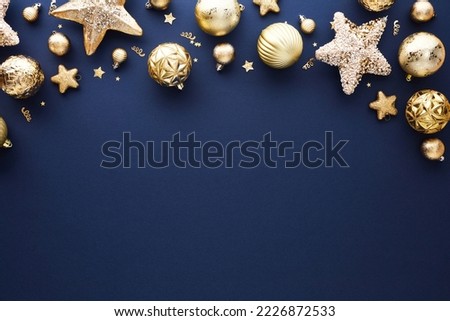 Dark blue Christmas background with golden stars, baubles, confetti. Merry Christmas or Happy New Year holiday frame, banner mockup , postcard, greeting card template