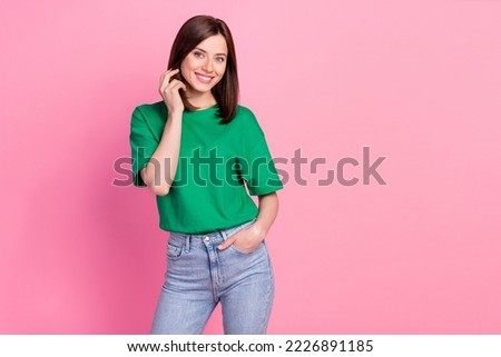 Photo portrait of stunning young woman hand touch hair posing clothes promo dressed trendy green look isolated on pink color background Royalty-Free Stock Photo #2226891185