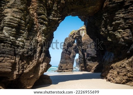 As Catedrais beach - Beach of the Cathedrals - in Galicia, Spain. Cliffs and ocean view Royalty-Free Stock Photo #2226955699