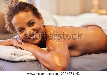 Spa, scrub and relax with black woman for exfoliation massage, skincare and luxury. Beauty, cosmetics and treatment with mature lady sea salt therapy on table for natural, wellness and body care Royalty-Free Stock Photo #2226973143
