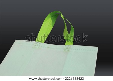 Beautiful Non Woven grocery shopping bag with black background. A gift bag that someone will remember. 