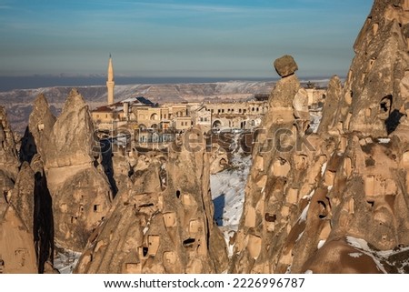 Panoramic view of Ortahisar castle with mosque and old town at Cappadocia, Turkey. Royalty-Free Stock Photo #2226996787