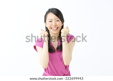 happy young woman against white background