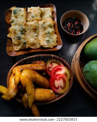 homemade lunch menu, crispy fried chicken, tempe mendoan with soy sauce and mango fruit